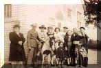 L to R: Grandma Margaret Mary Zink, Joseph Zink, Chuck Vurginac on horse, Lois Zink, Margaret Vurginac holding Gloria?, John Zink, Mary Vugrinec, Charles Vurginac, Carl Vugrinec, Rita Vurginac holding Carol Ann Lassing? Irene standing in front. House that Carl Built.